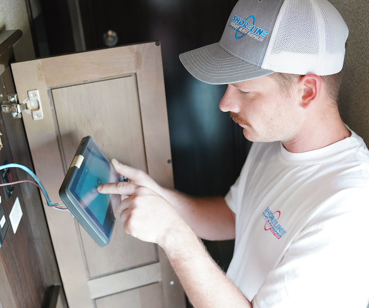 Zac working on the RV Electrical panel